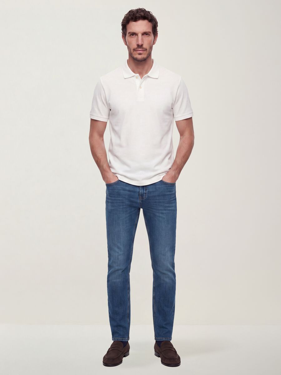 Jeans blu skinny in cotone elasticizzato_0
