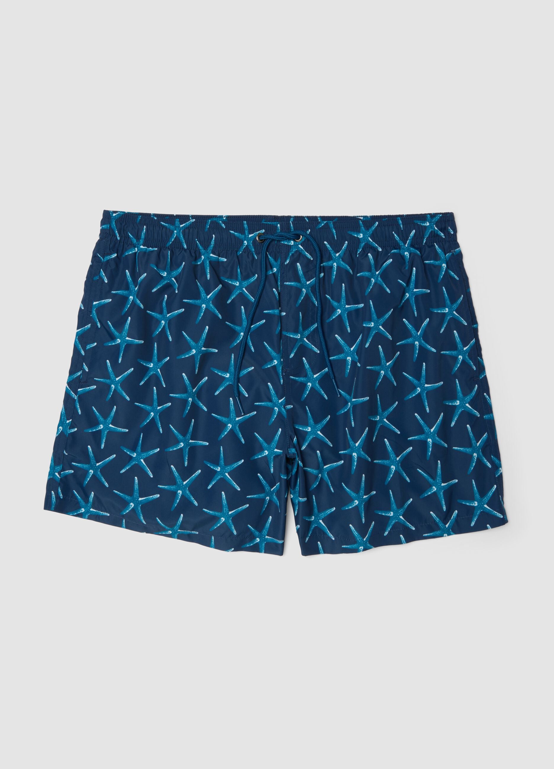 Blue boxer swim shorts with starfish print