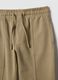 Pantaloni jogger in misto cotone beige da bambino regular fit con elastico_2