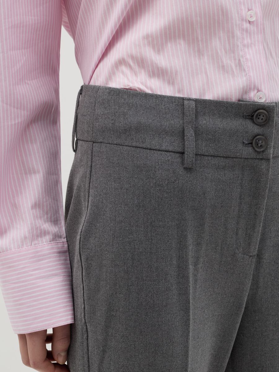 Flare-fit trousers with double button_3