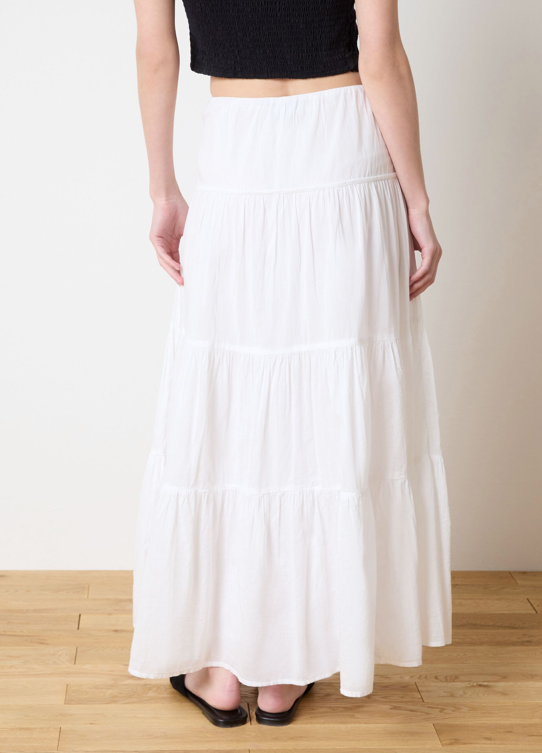 Long white tiered skirt