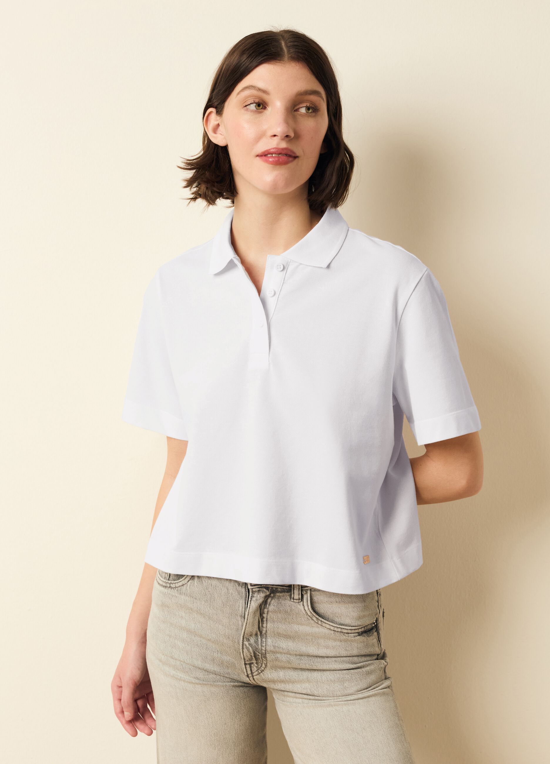 Polo shirt in solid colour piquet