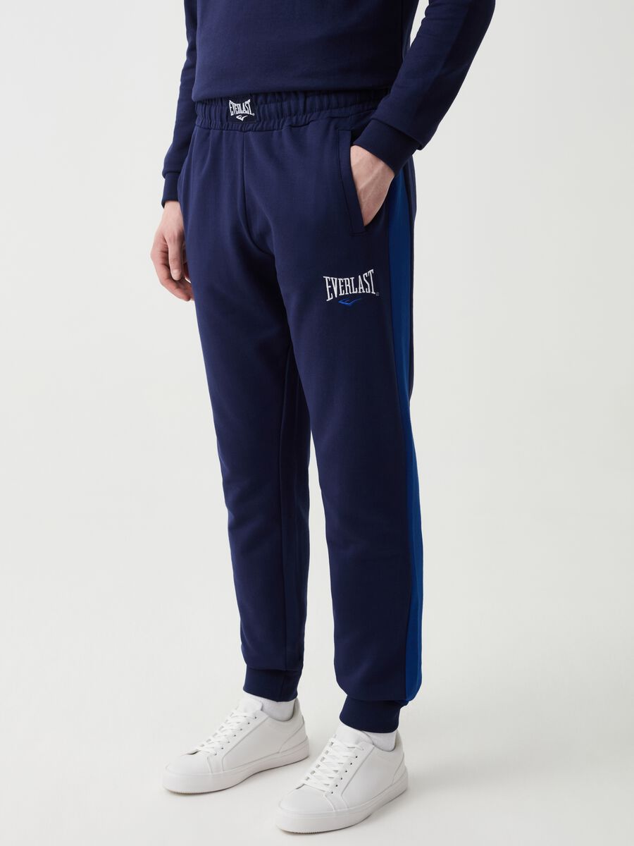 Joggers with contrasting bands and embroidered logo_1