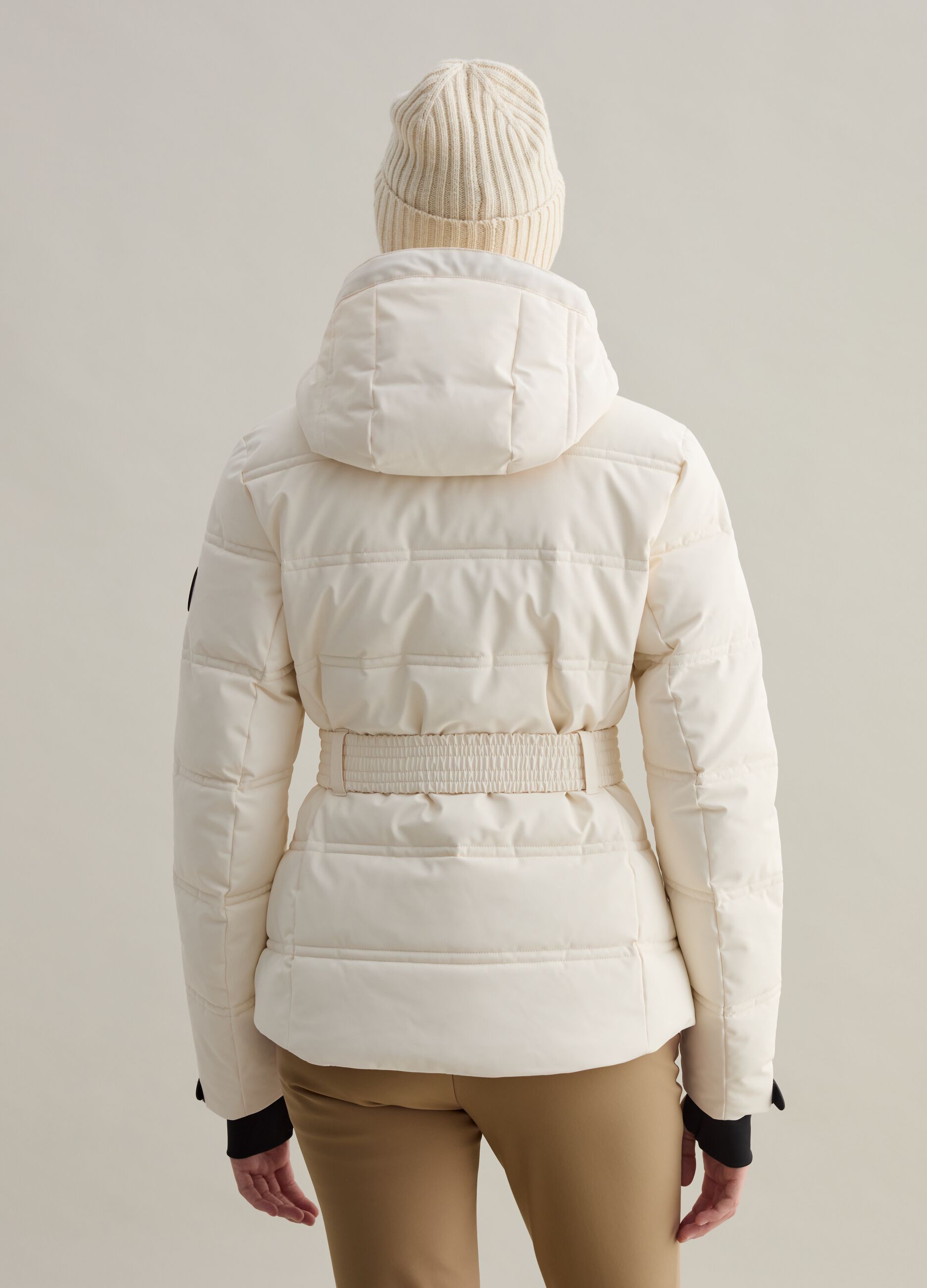 Quilted down jacket with belt