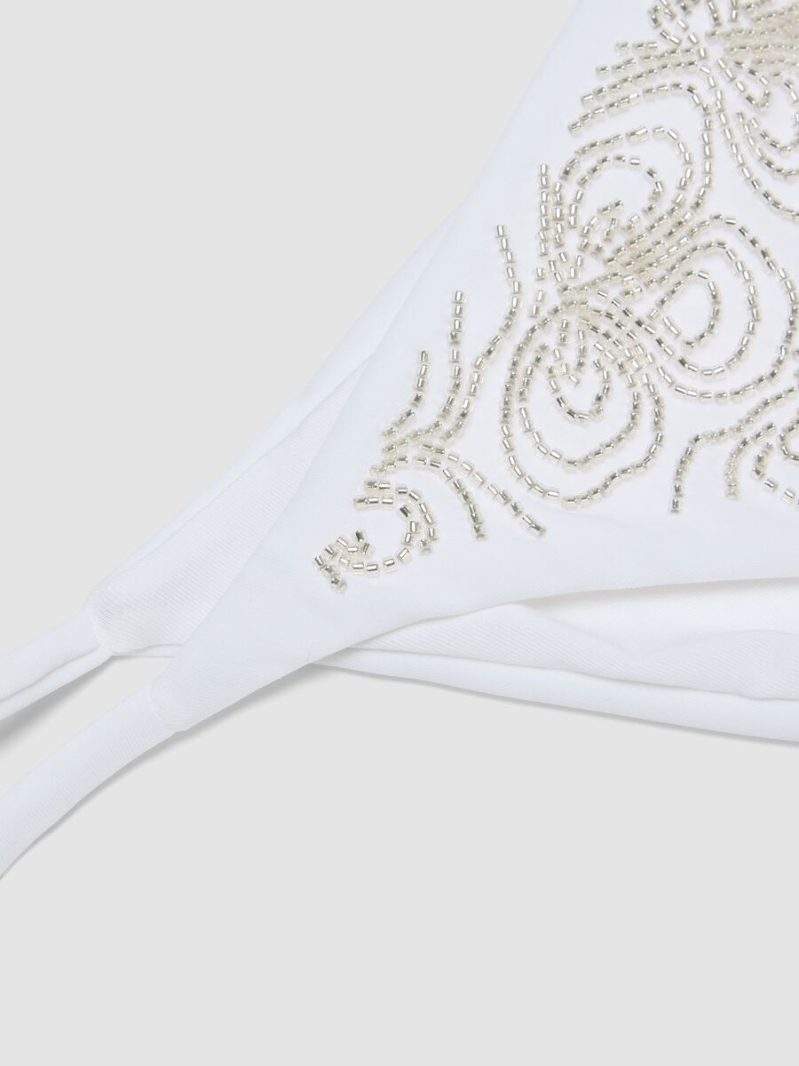 White stretch bikini bottoms with decorative beads_5
