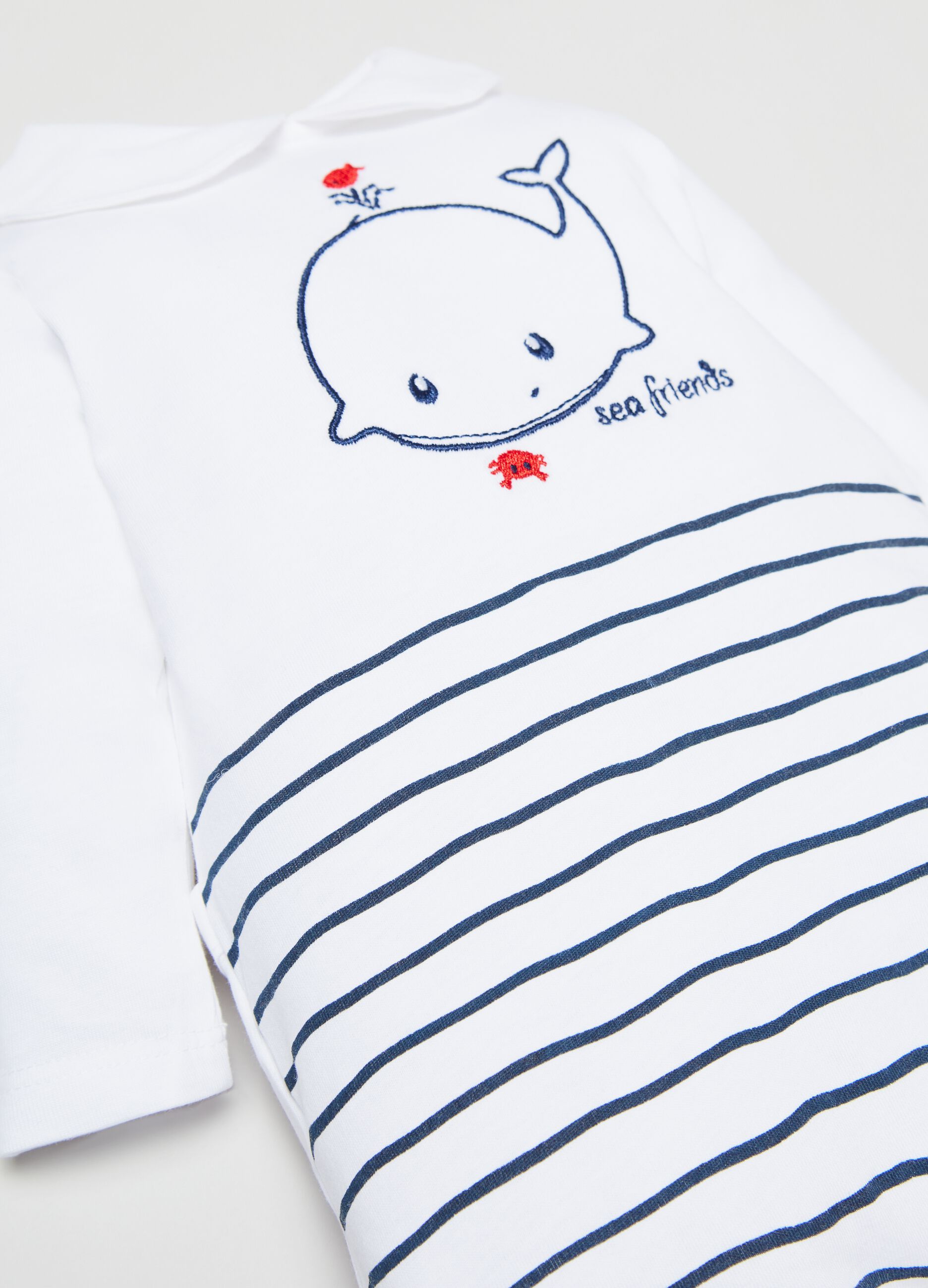 Onesie with feet and embroidered whale