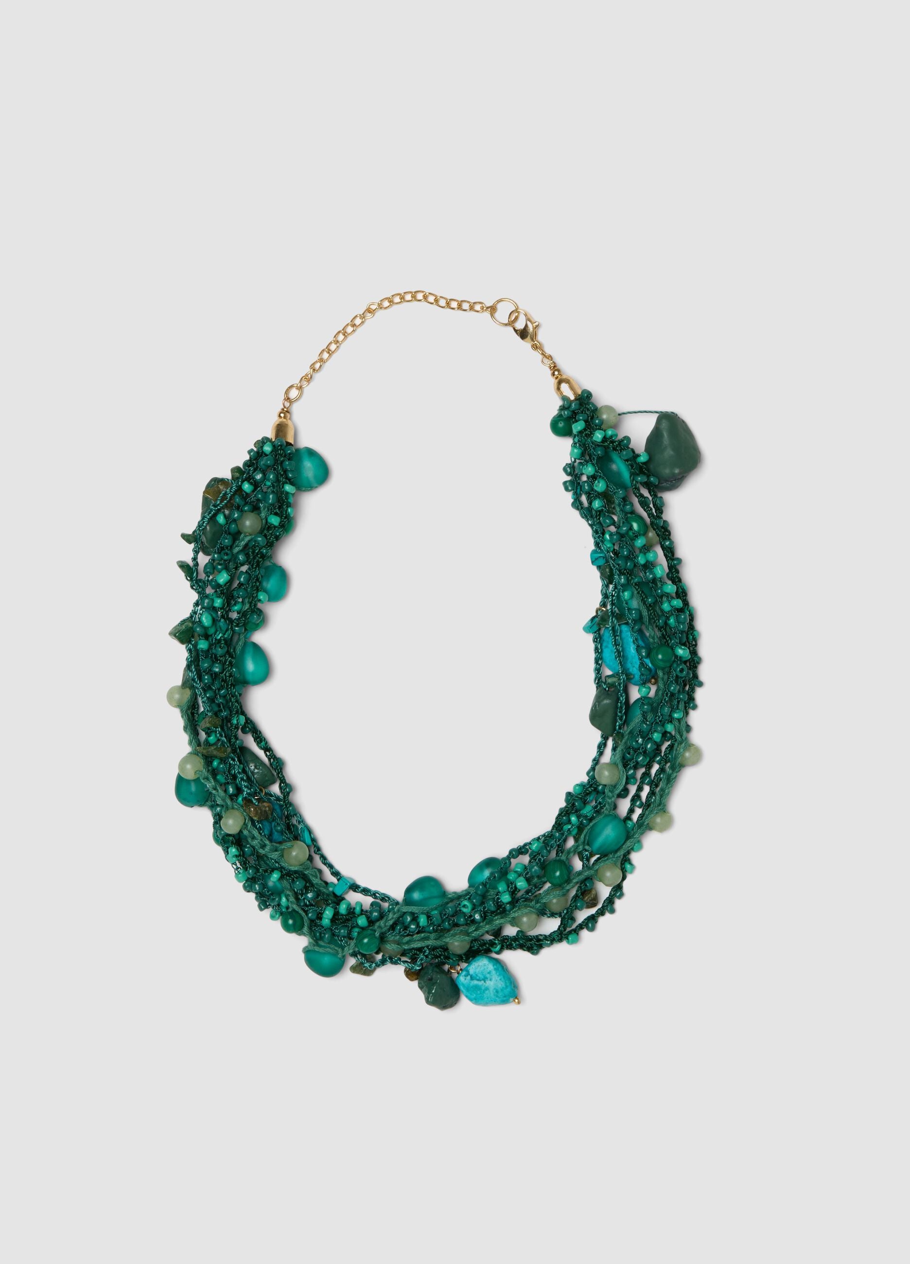 Green multi-strand necklace with decorative stones