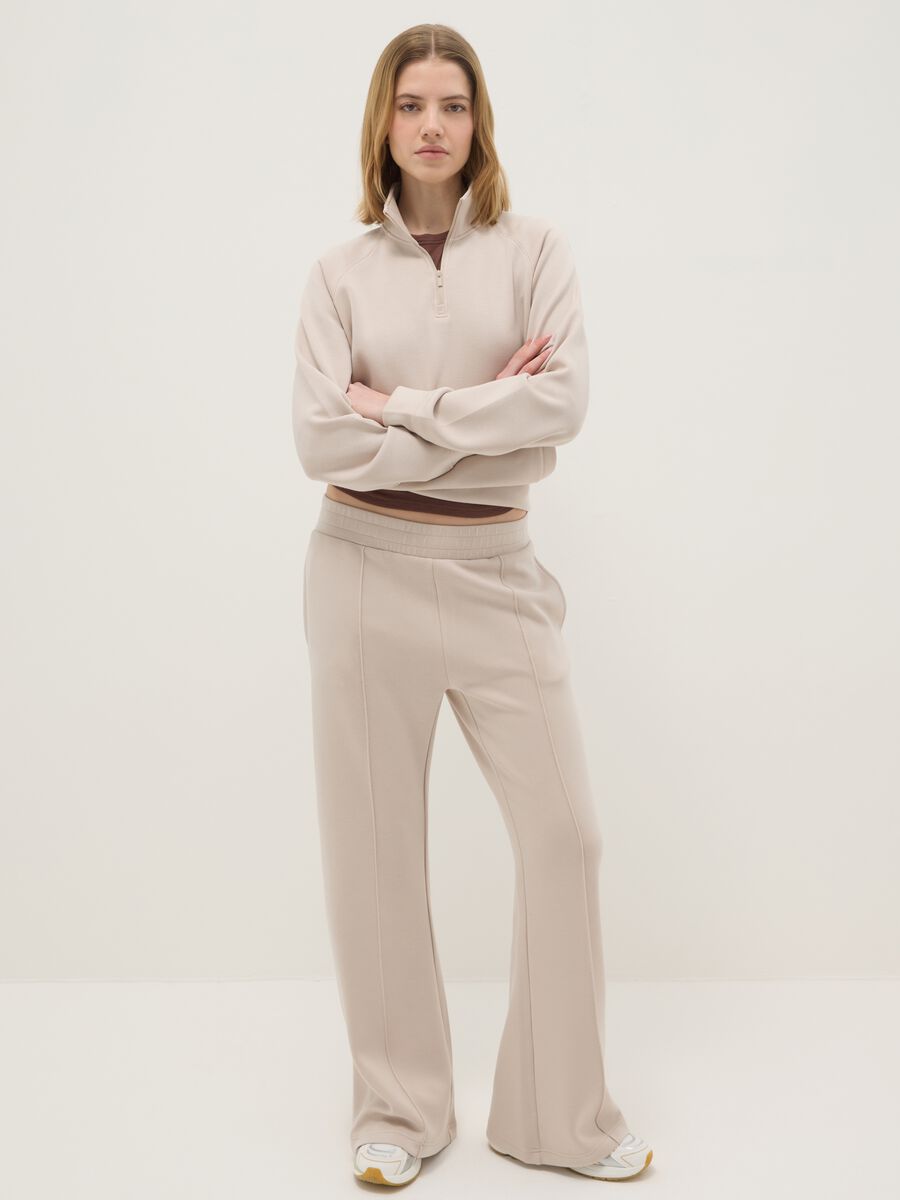 Beige wide leg trousers in stretch modal blend_0