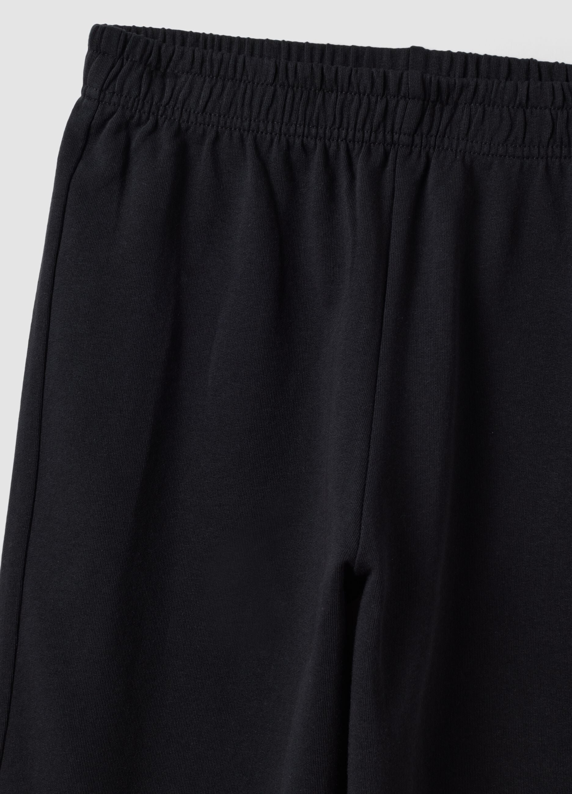 Black jogger trousers in organic cotton and viscose blend for girls