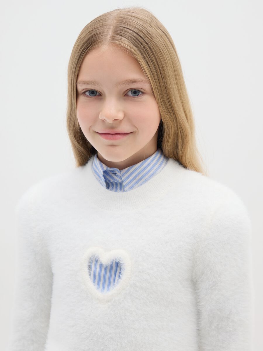 Girls' white sweater fitted with perforated heart_2