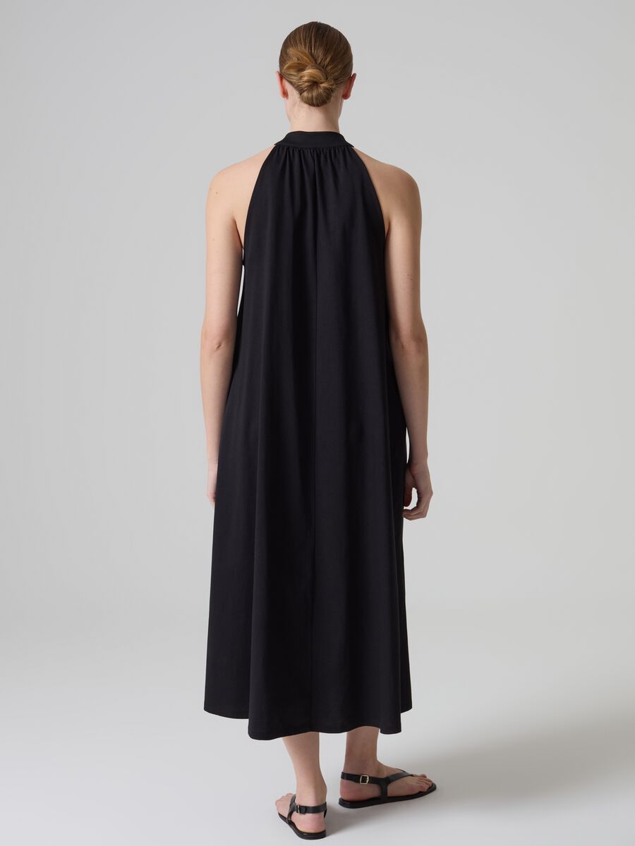Contemporary long dress with halter neckline_2