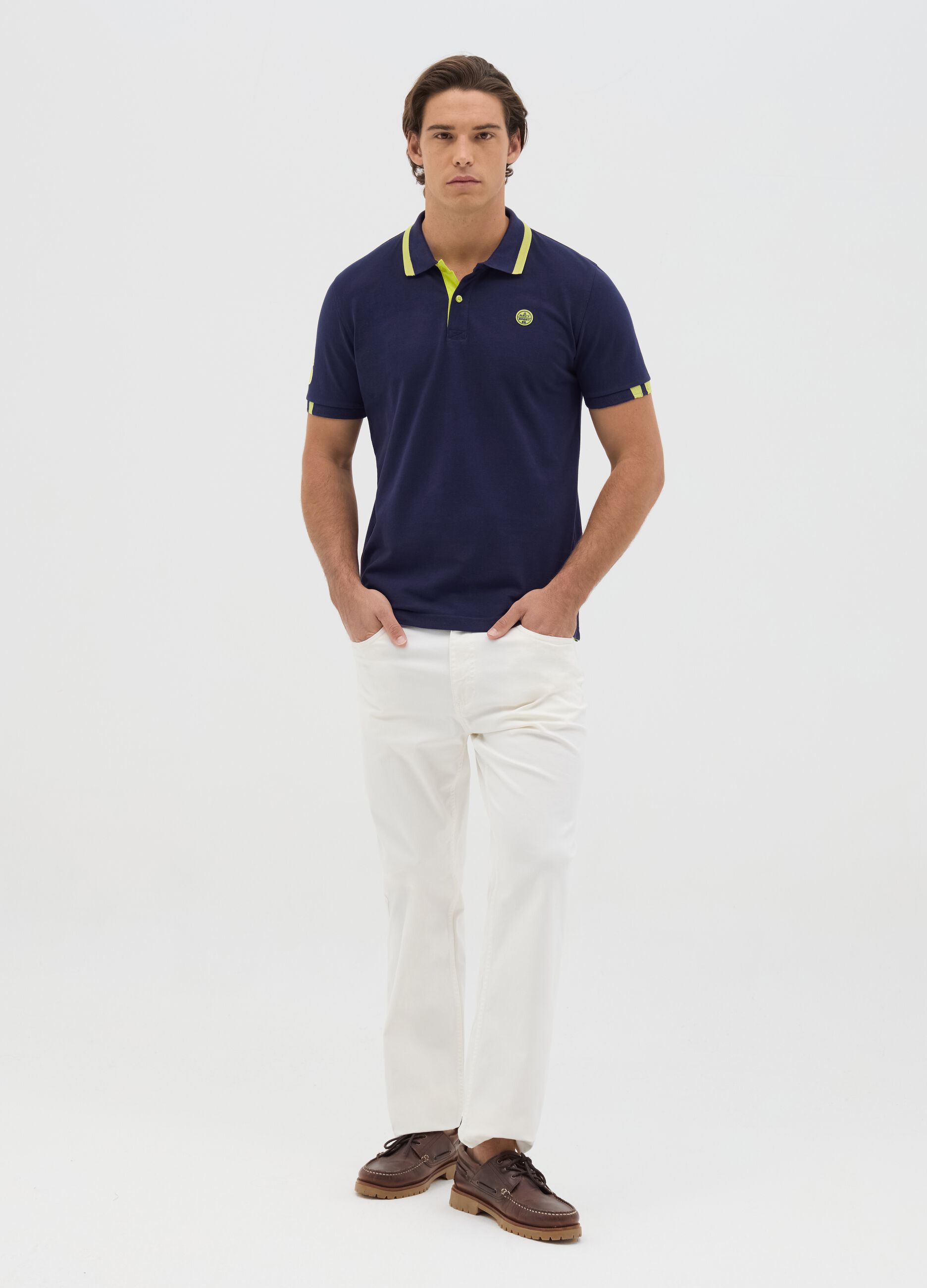 Blue polo shirt in cotton with Navy Sport patch