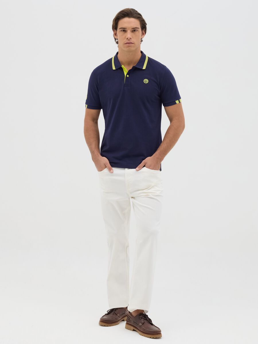 Blue polo shirt in cotton with Navy Sport patch_1