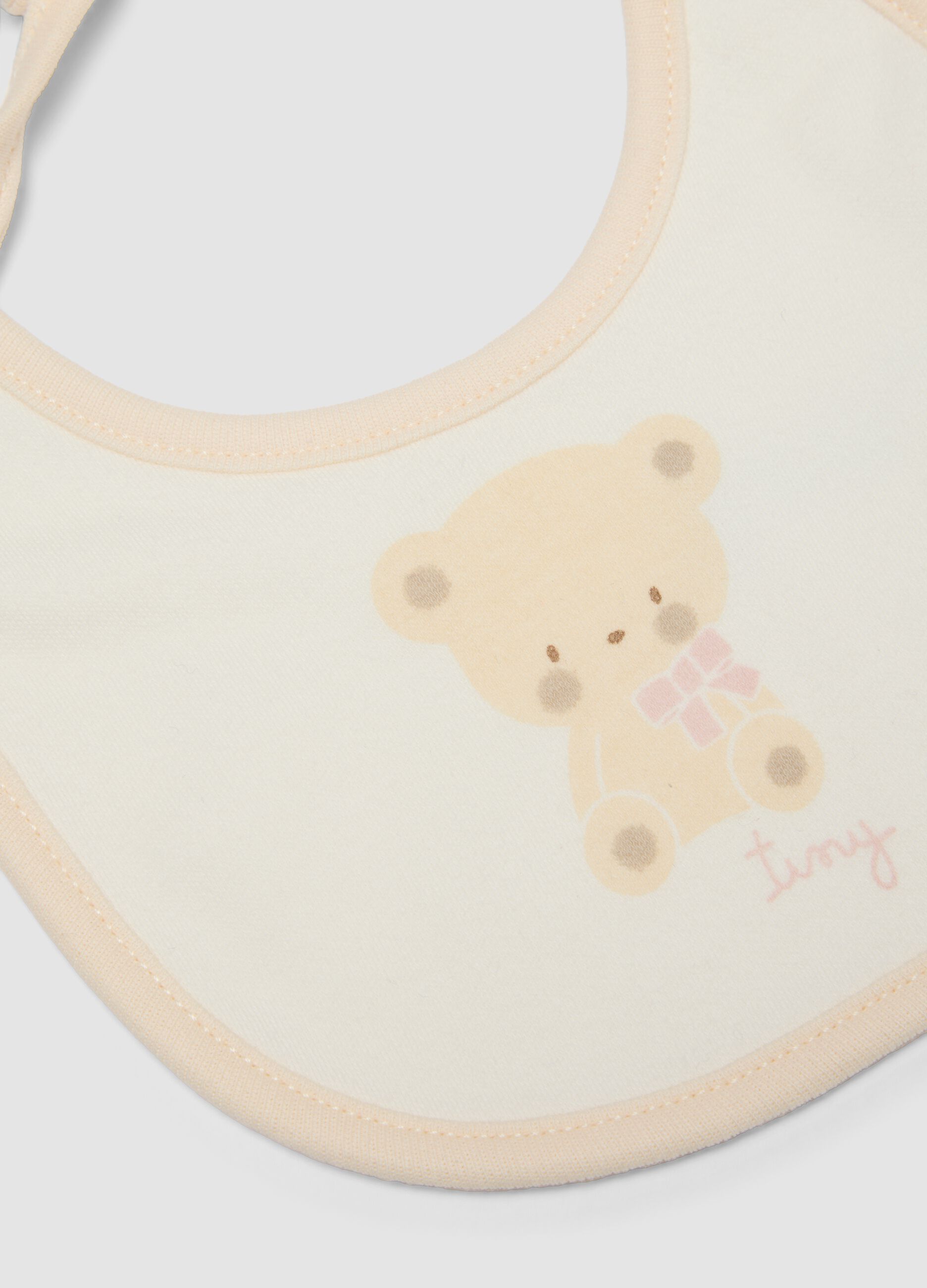 2-pack of beige bibs in pure organic cotton with teddy bear print