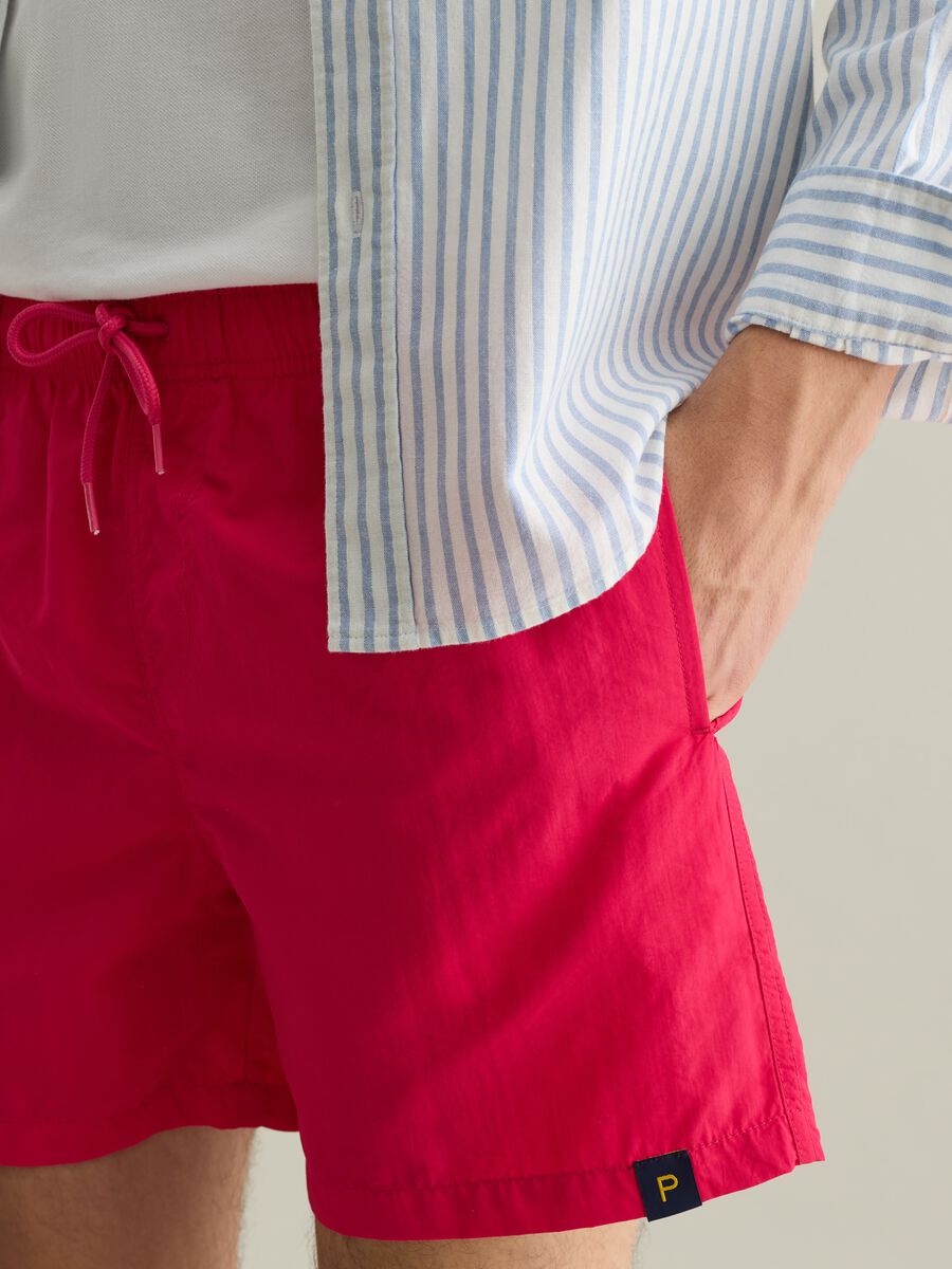 Men’s regular-fit swim boxers in pink blend with elastic waist_3