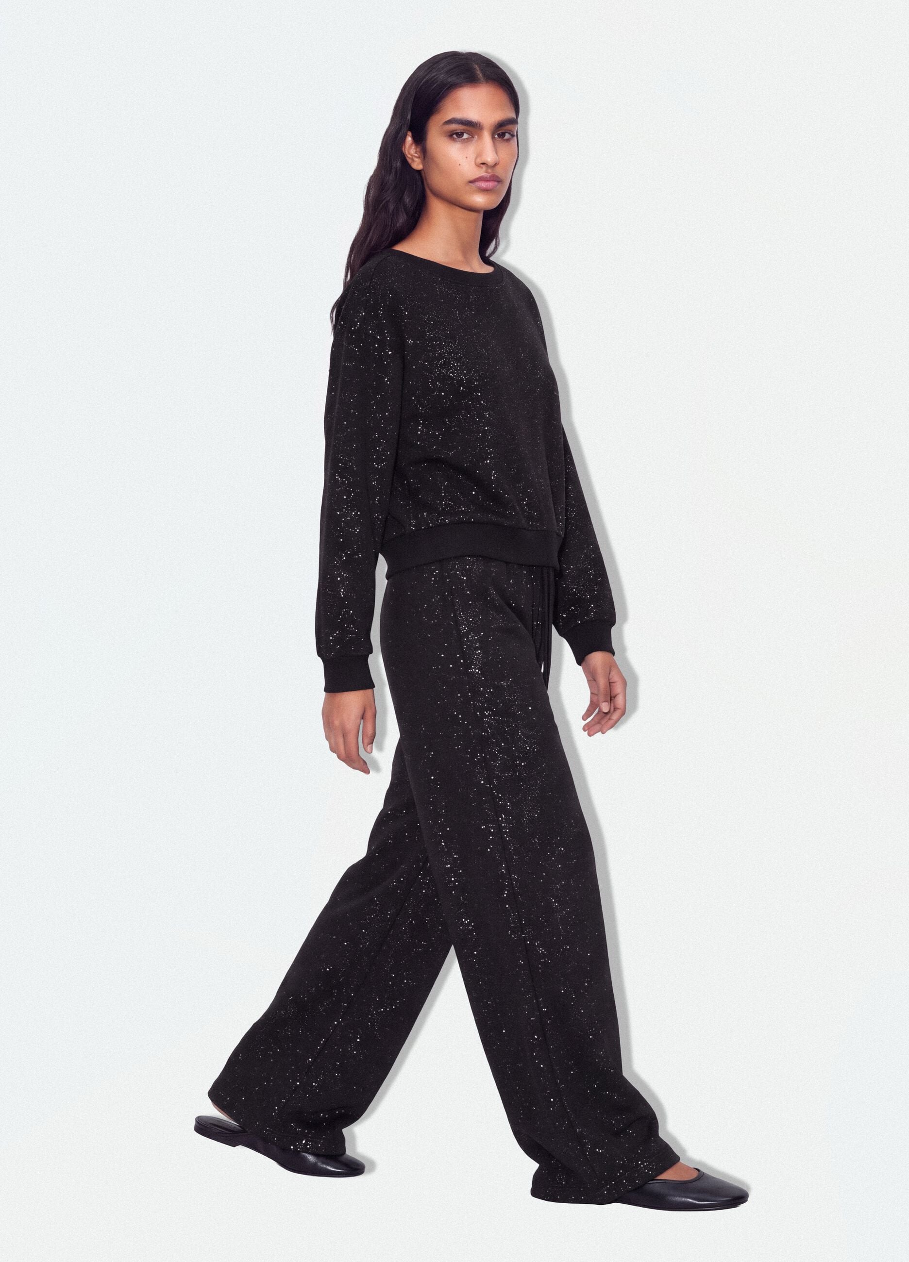 Black cotton-blend sweatshirt with bateau neckline and glitter