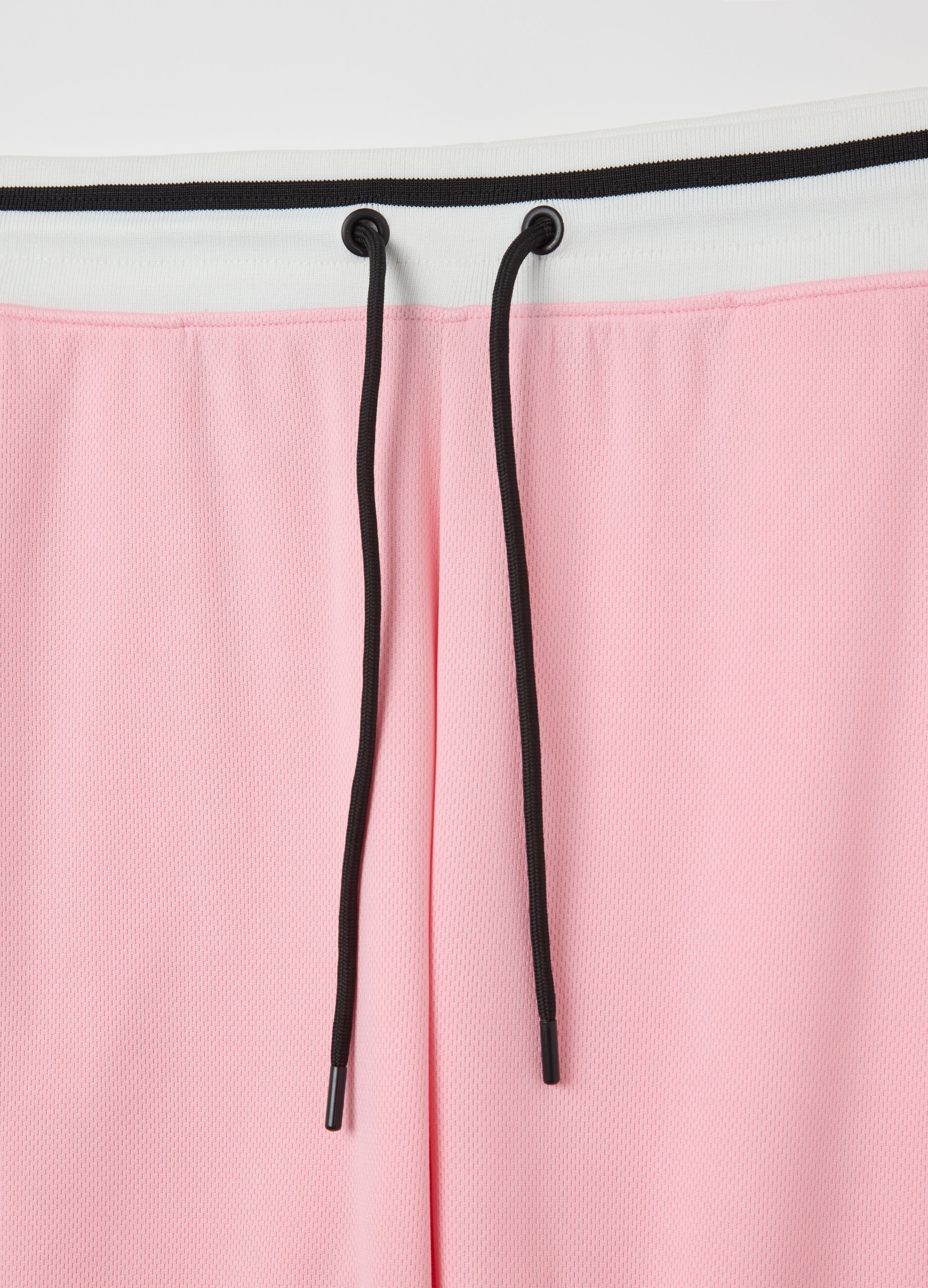Pink Bermuda joggers with black details