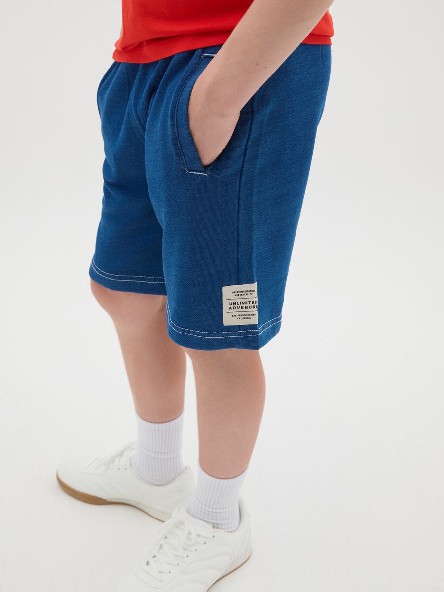 Short blue trousers in 100% cotton_2