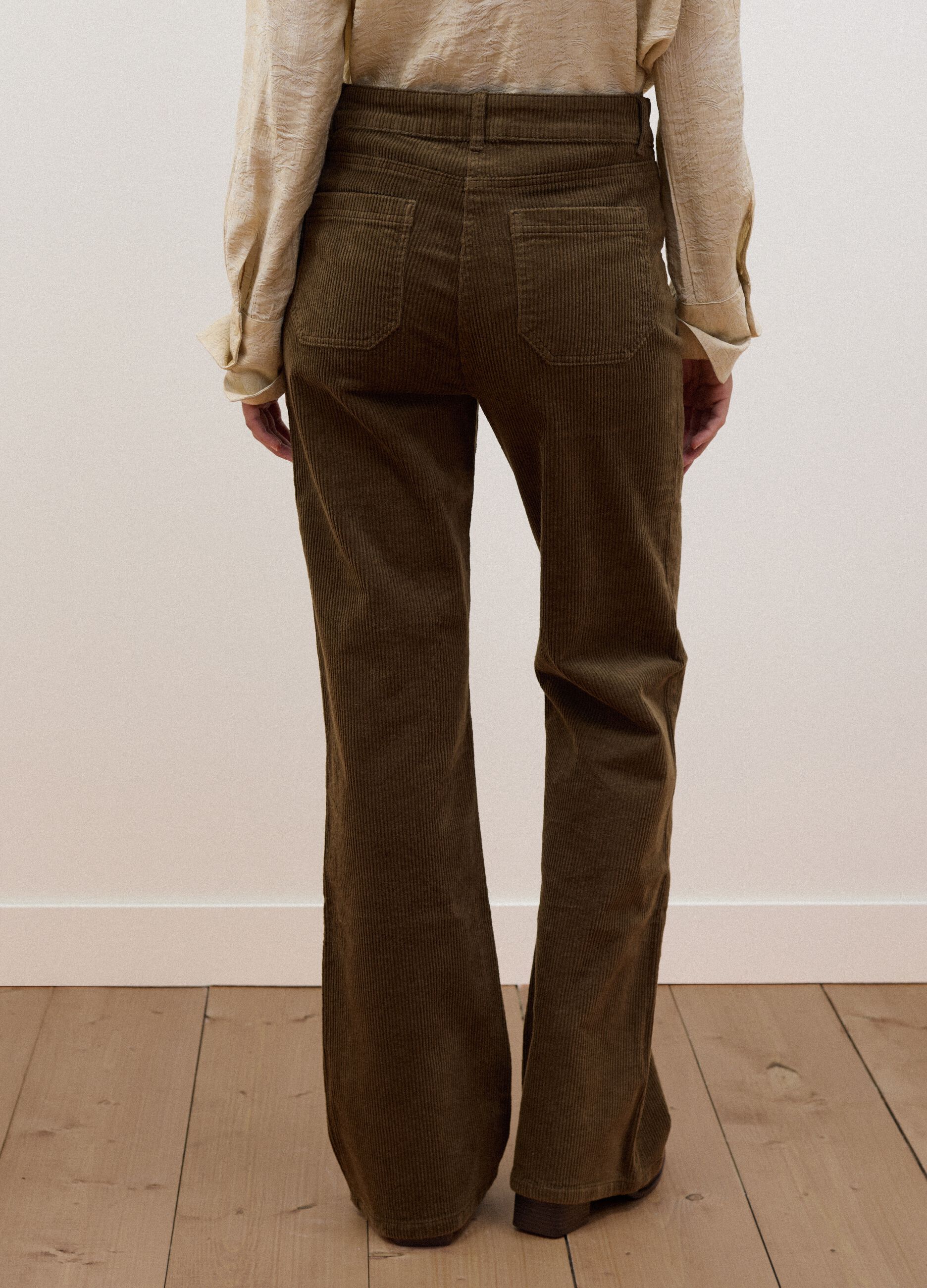 Green flared ribbed stretch-cotton trousers