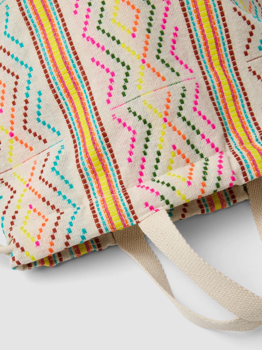 Zaino con fantasia multicolor e spallacci regolabili_2