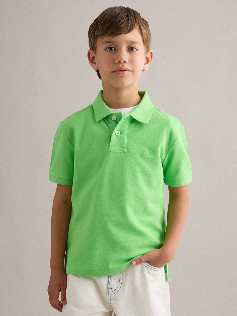Polo in cotone elasticizzato verde da bambino regular fit_1