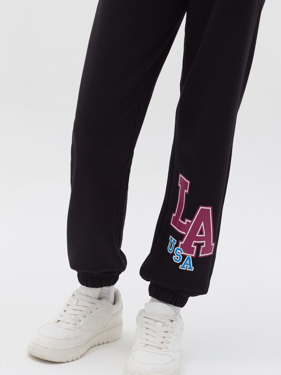 Fleece joggers with print_1