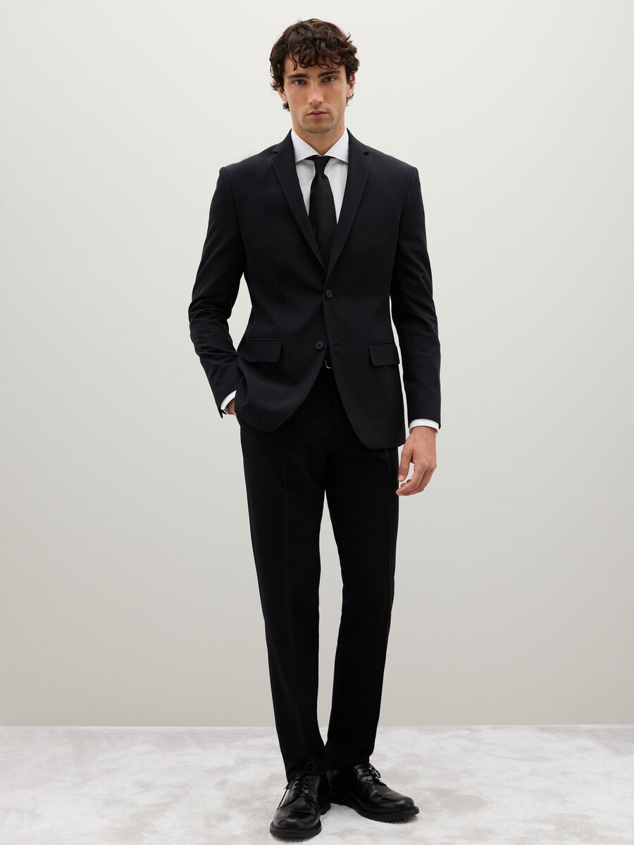 Black slim fit blazer with button closure_1