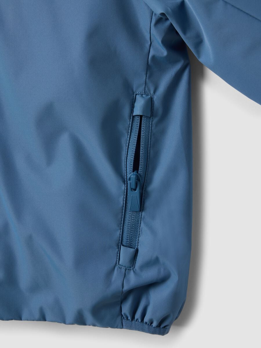 Blue kids&rsquo; rain jacket with hood and zip_3