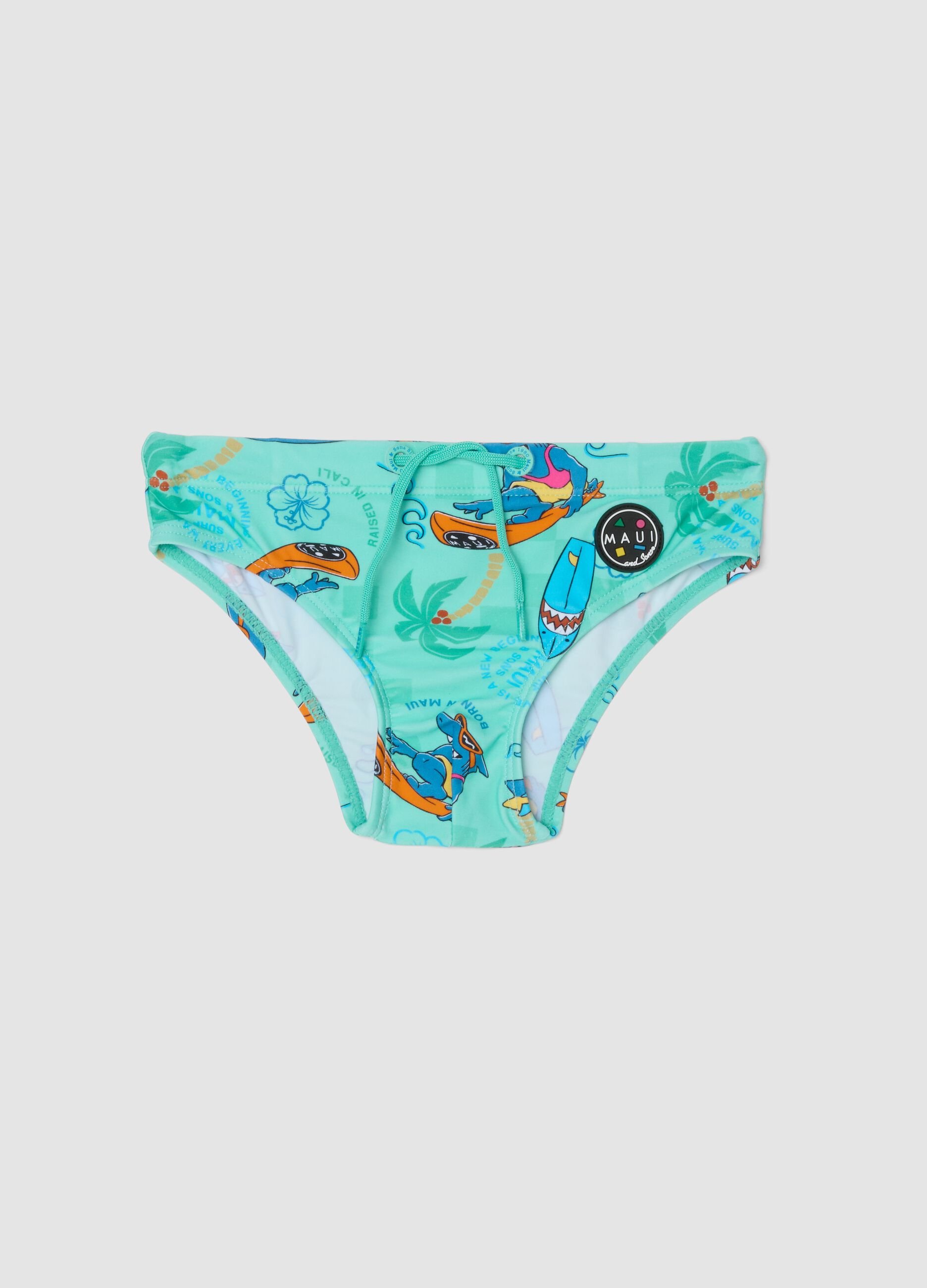 Boys&rsquo; blue stretch swim briefs with print