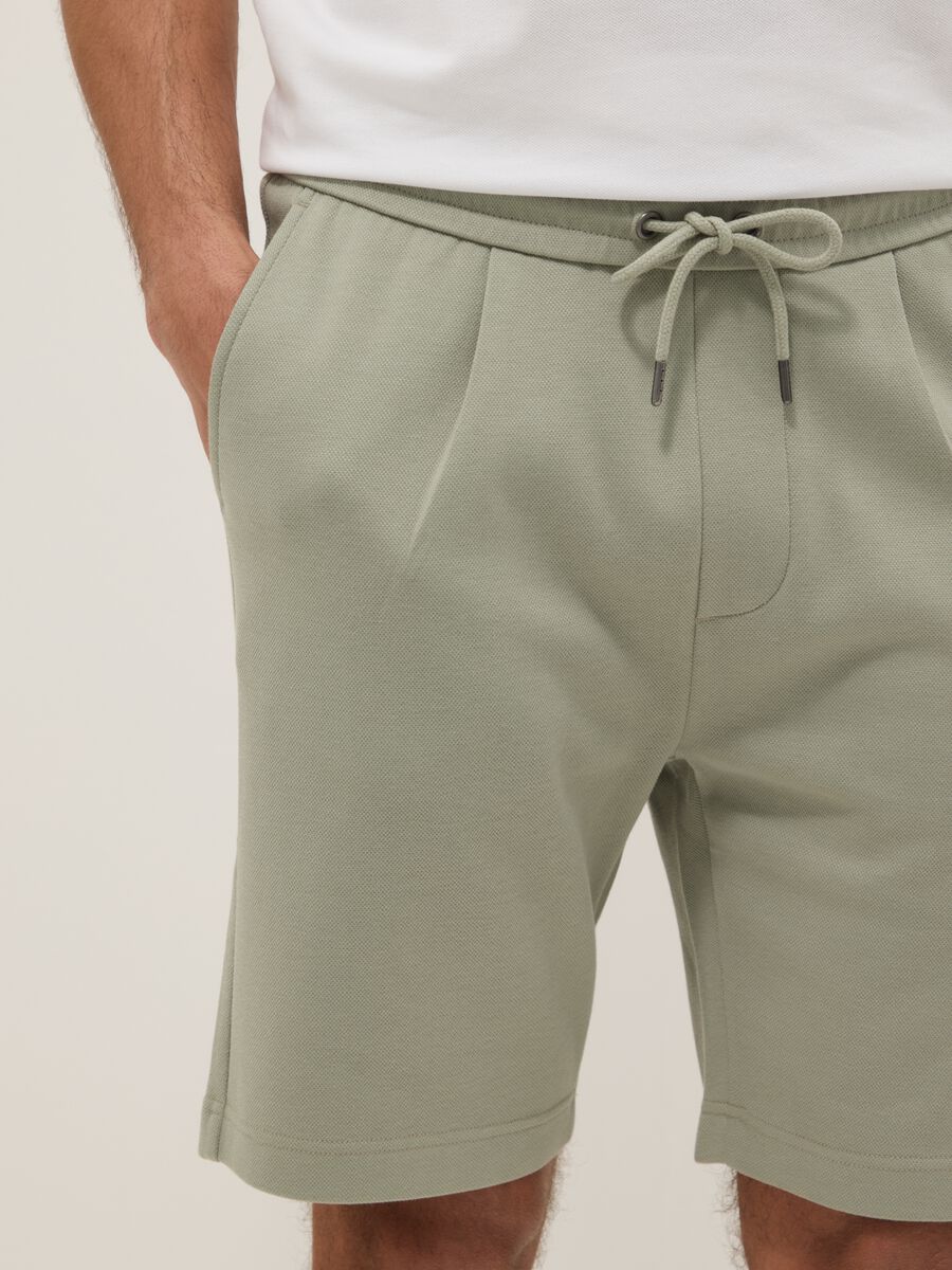 Shorts in puro cotone verde regular fit con coulisse_3