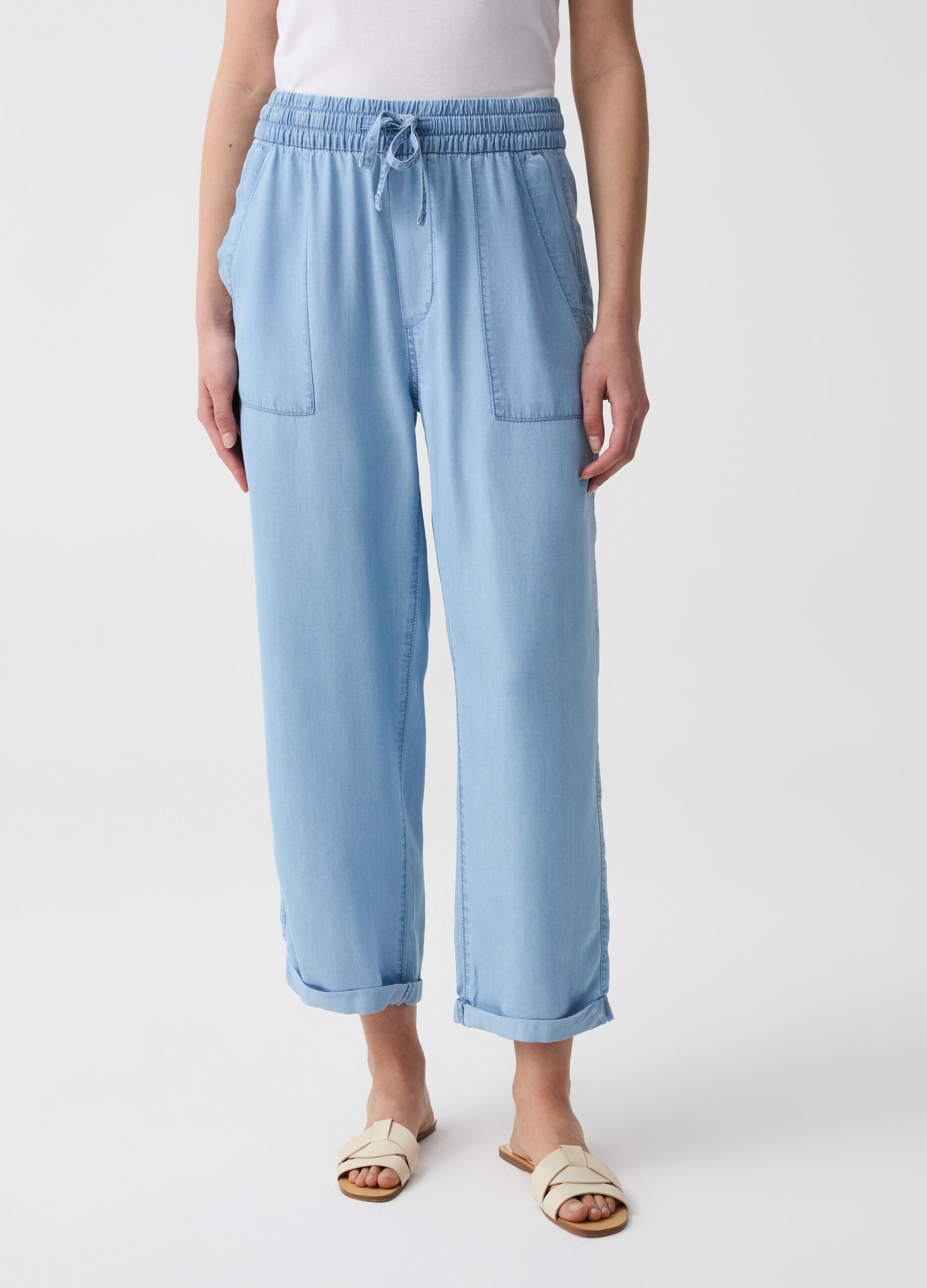 Joggers wide leg effetto denim con risvolti