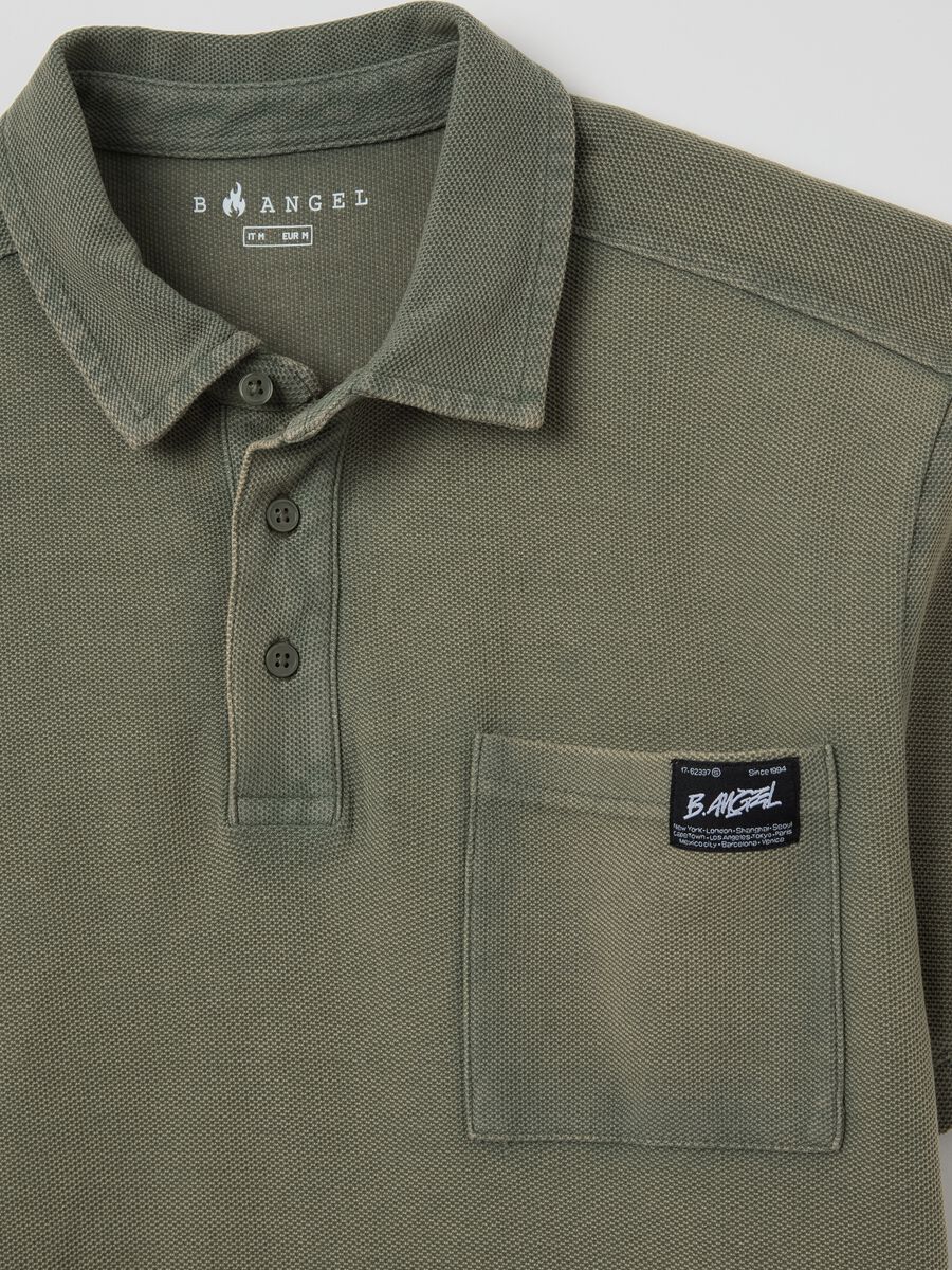 Green short-sleeved polo shirt in cotton piquet_5