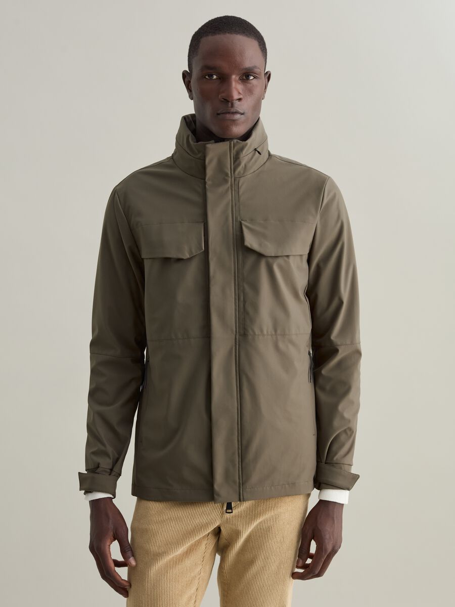 Short jacket in technical fabric with high neck_0