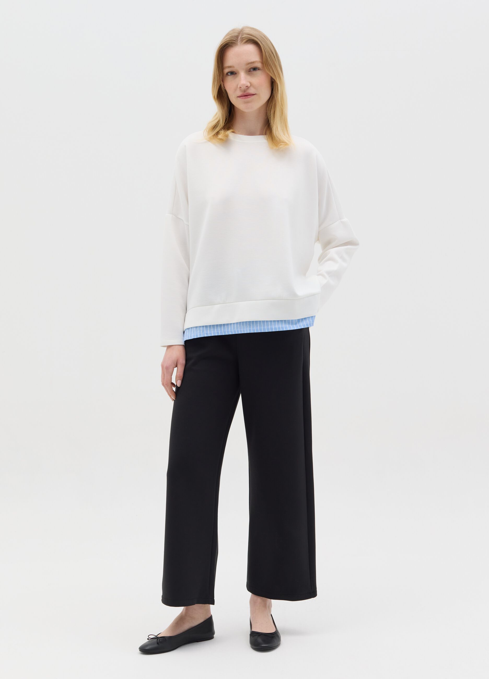 White top with layered-effect hem