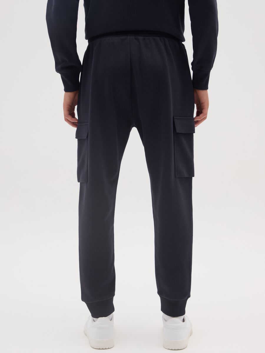 Blue cotton blend trousers with cargo pockets_3