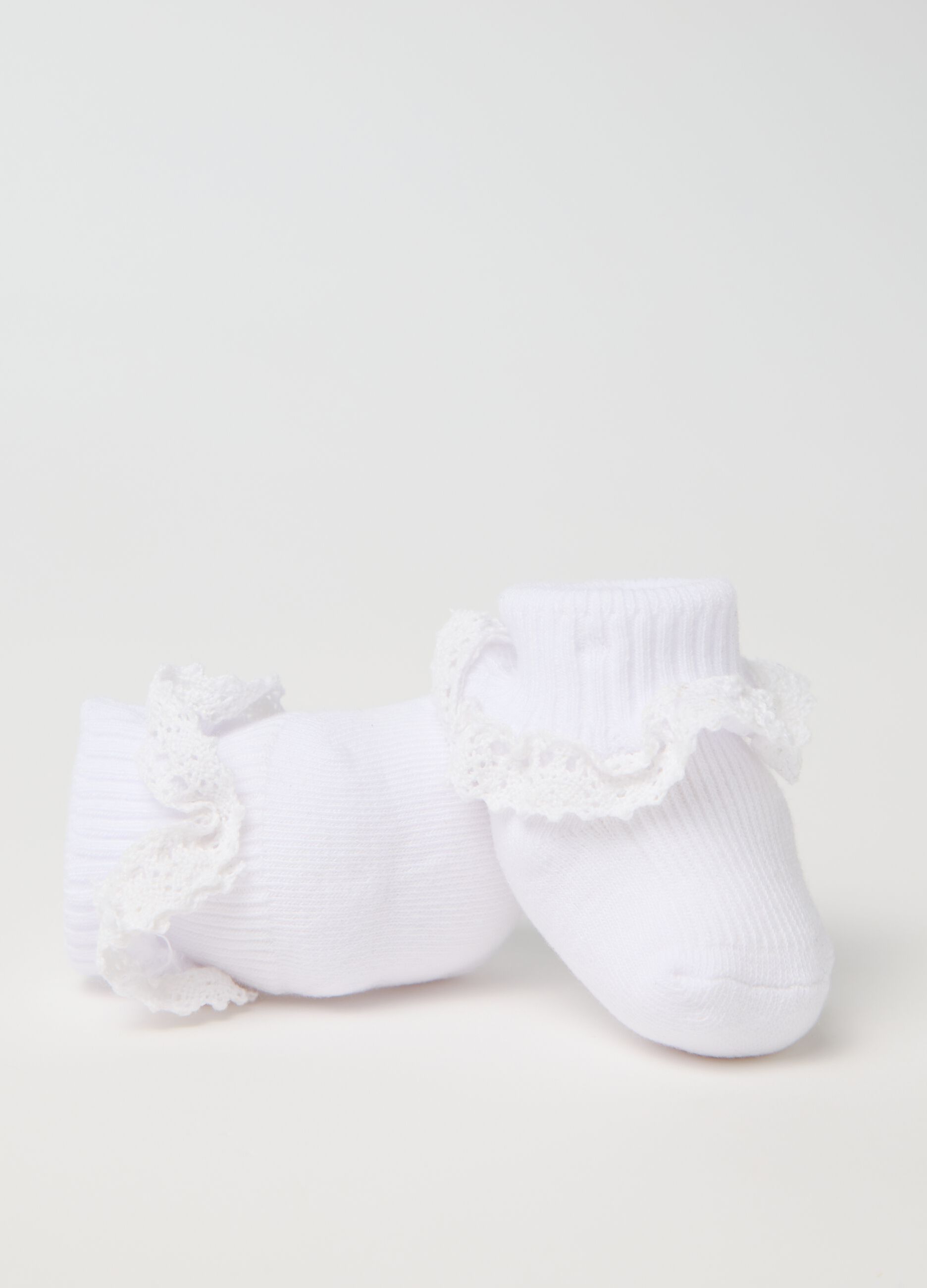 White knit shoes with broderie anglaise application
