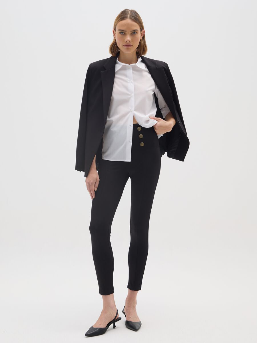 Leggings neri elasticizzati con bottoni decorativi_0