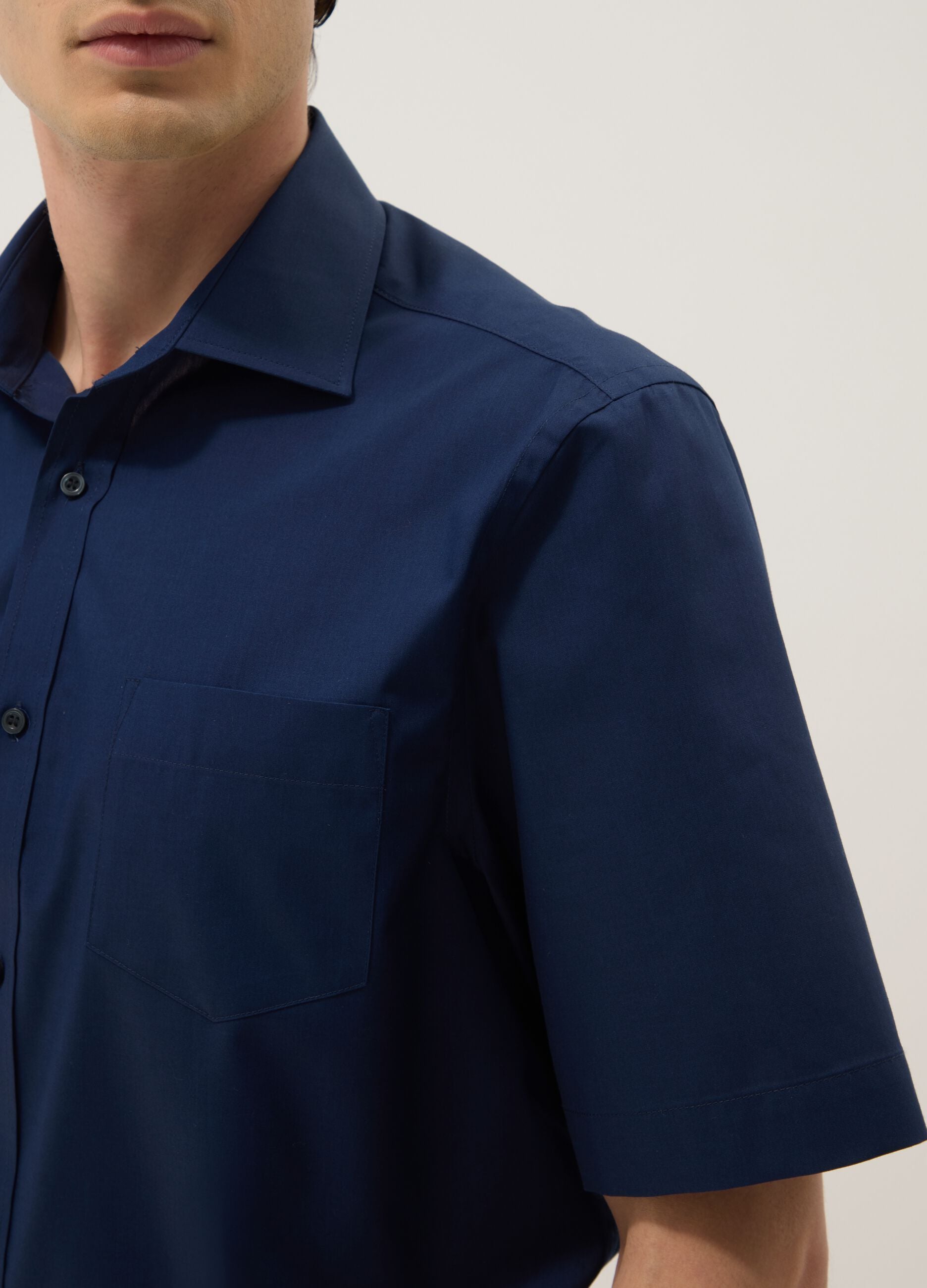 Blue short-sleeved shirt with classic collar