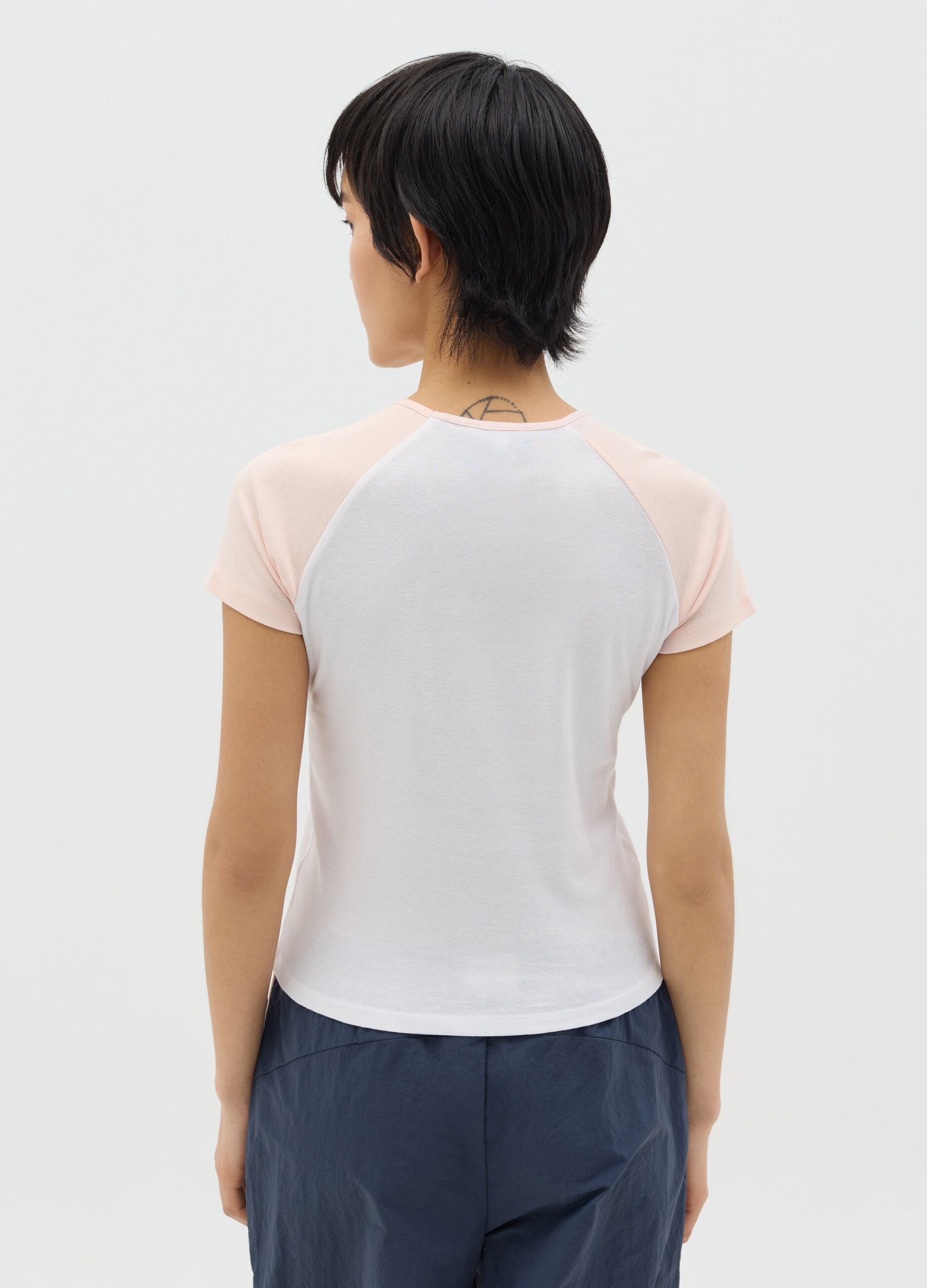 White T-shirt with pink raglan sleeves