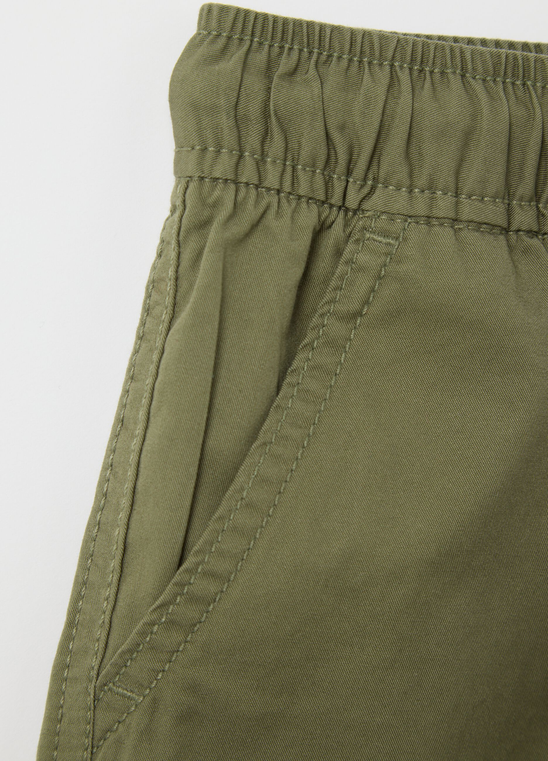 Green cargo shorts with drawstring