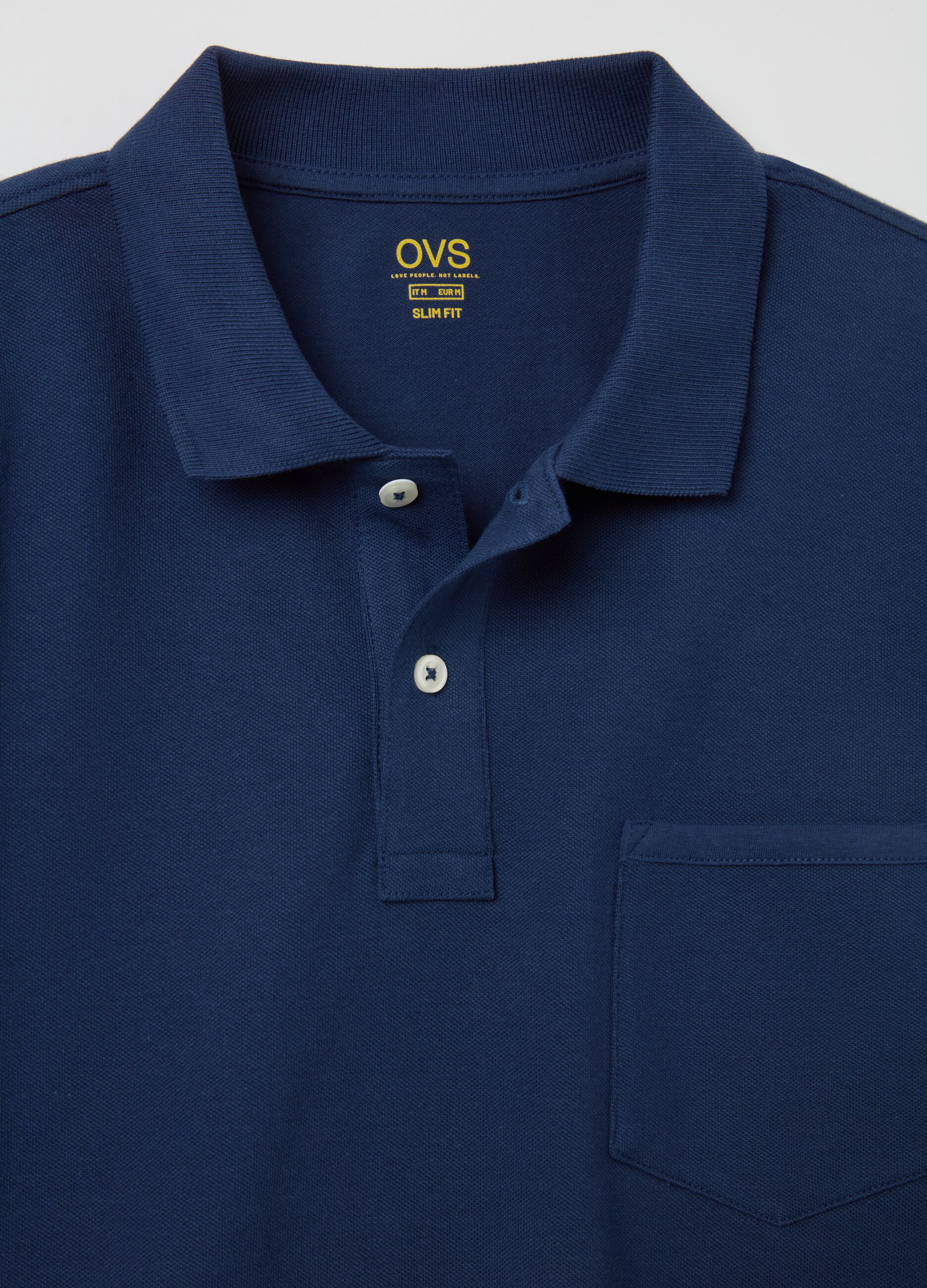 Polo in cotone stretch con tasca 