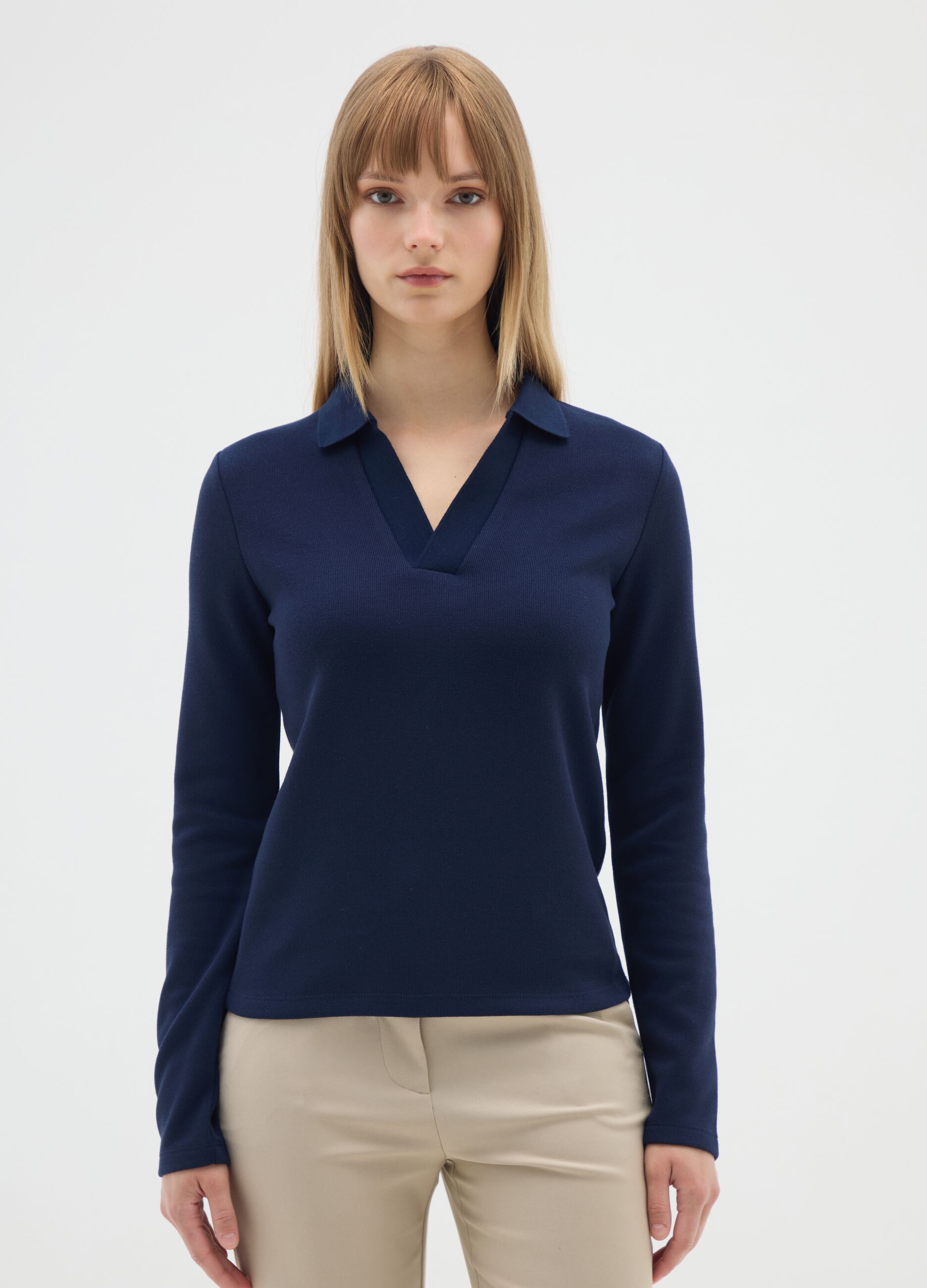Polo blu a maniche lunghe elasticizzata