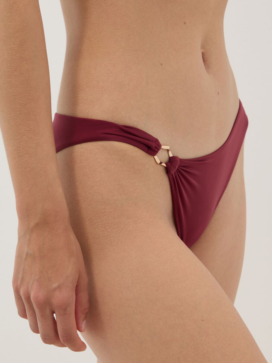 Red stretch bikini bottoms with gold-tone ring detail_3