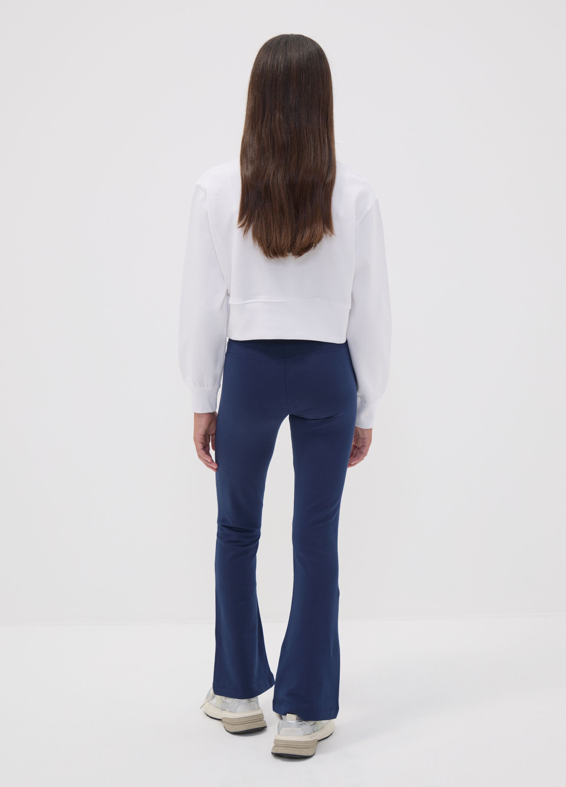 Girls&rsquo; blue flared trousers in stretch organic cotton