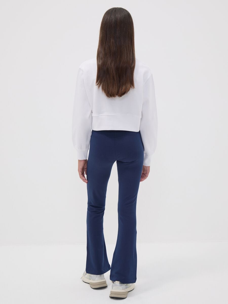 Girls&rsquo; blue flared trousers in stretch organic cotton_2