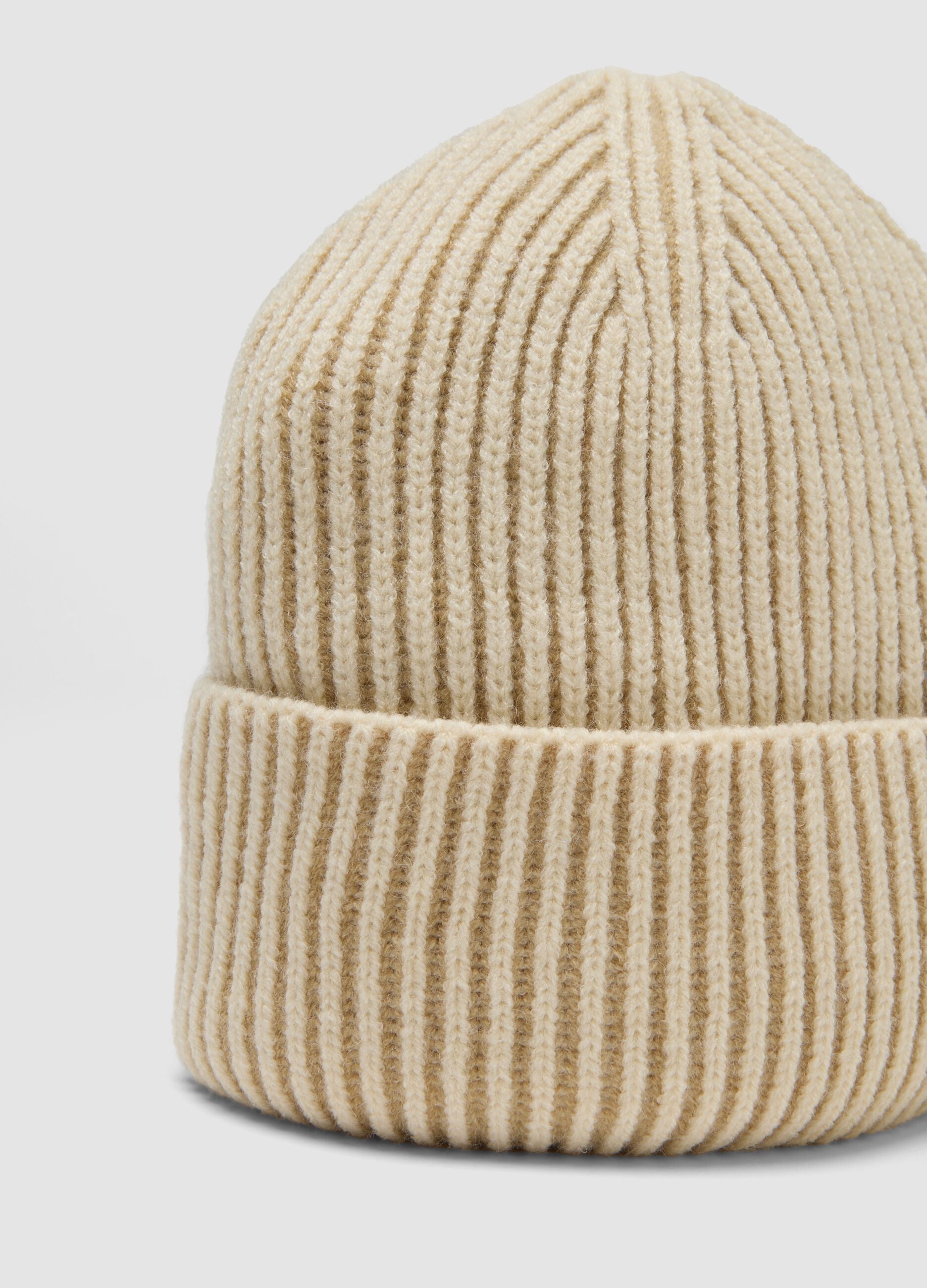 Beige ribbed knit beanie with turn-up