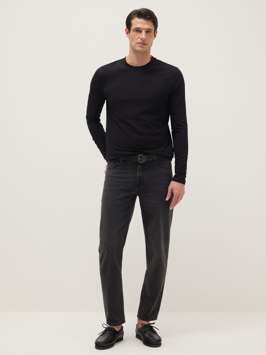 Jeans in misto cotone denim nero relaxed fit elasticizzati_1