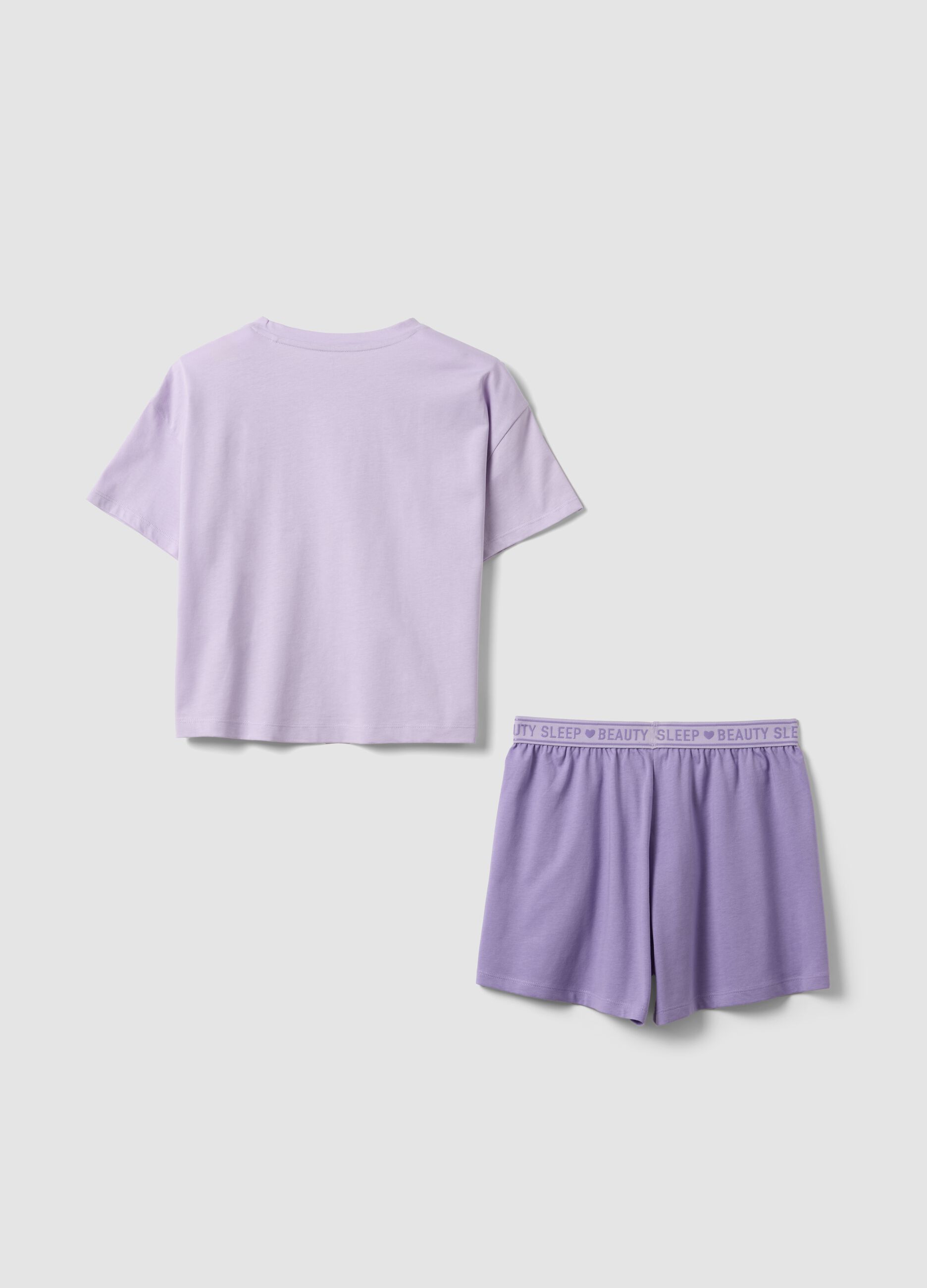 Girls&rsquo; purple short pyjamas in 100% organic cotton with slogan
