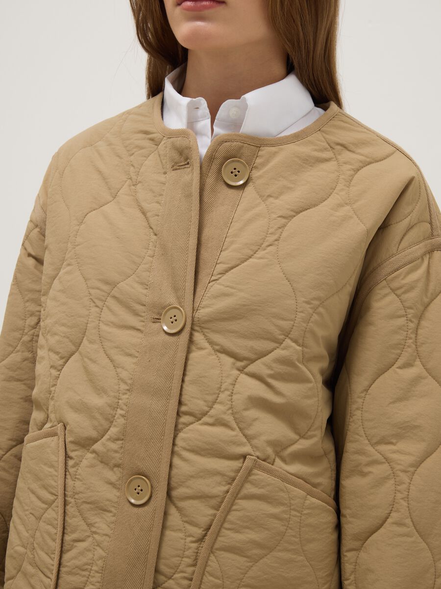Beige padded regular fit jacket with buttons_3