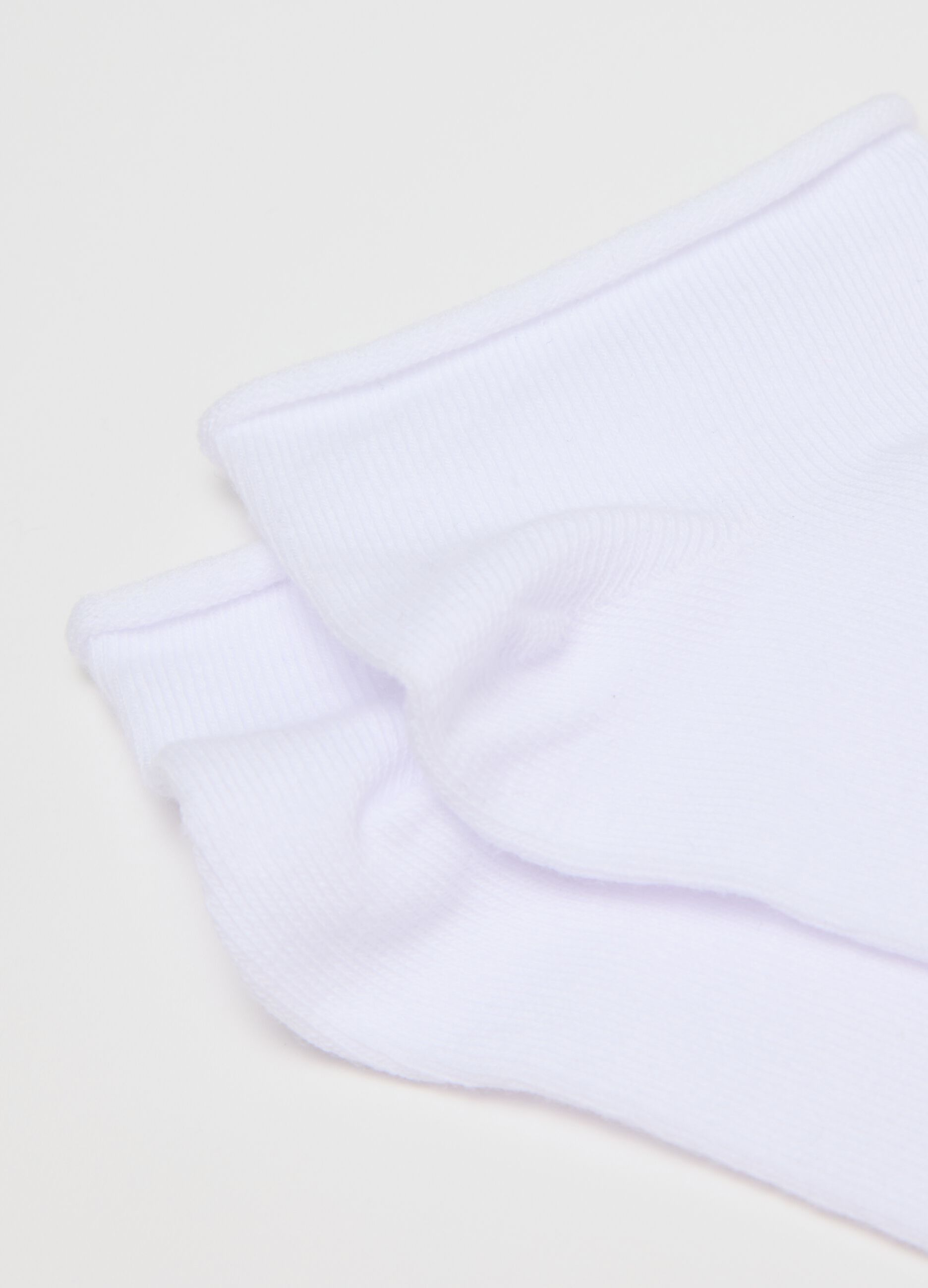 Three-pair pack white, grey and purple stretch shoe liners